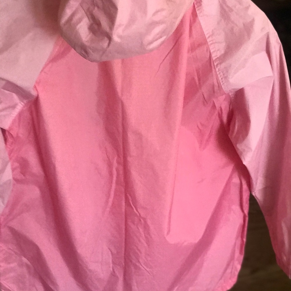 Pink hooded children’s rain coat